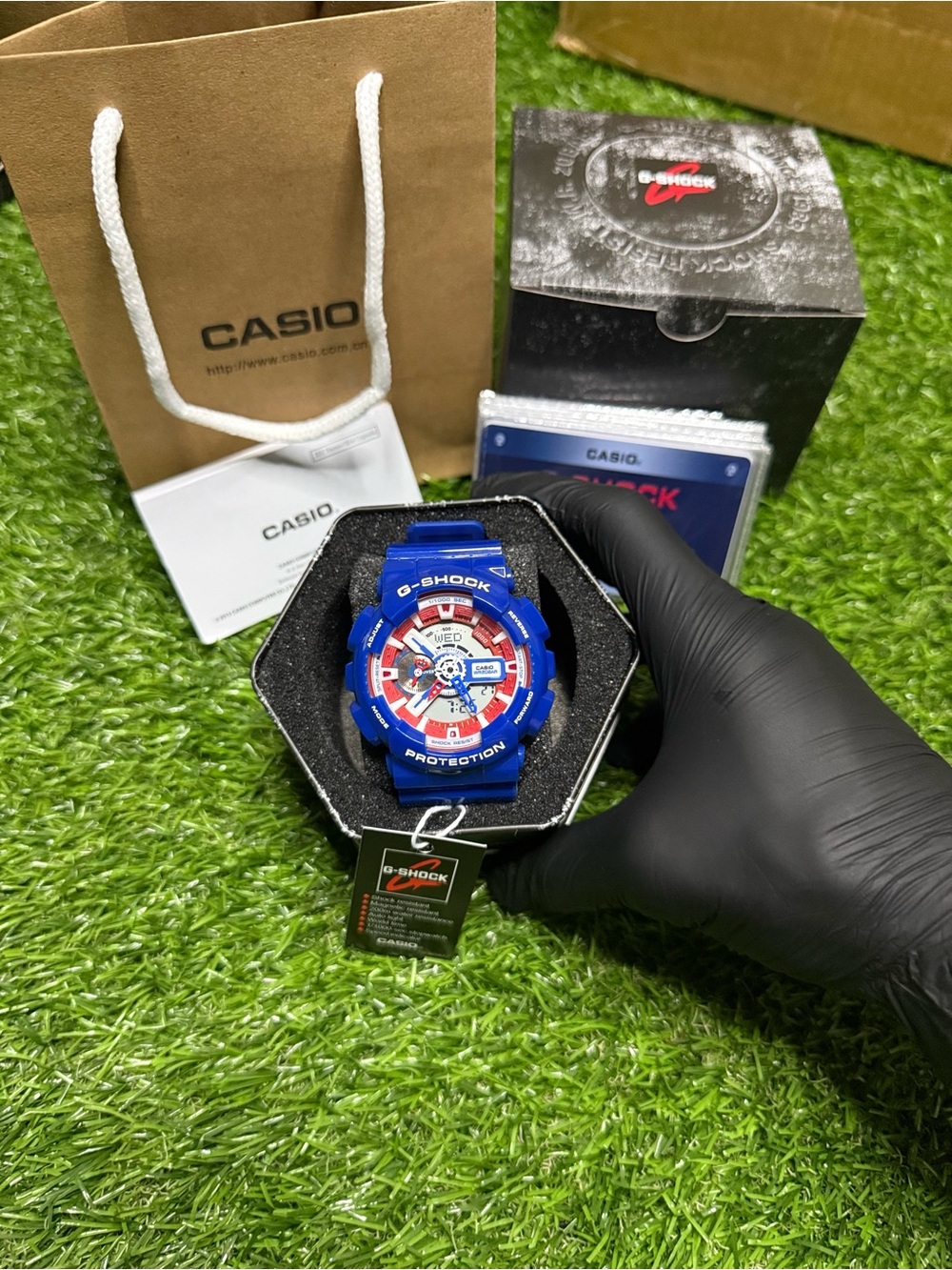 Casio G-Shock GA-110 Blue Watch with Red & White Dial Accents